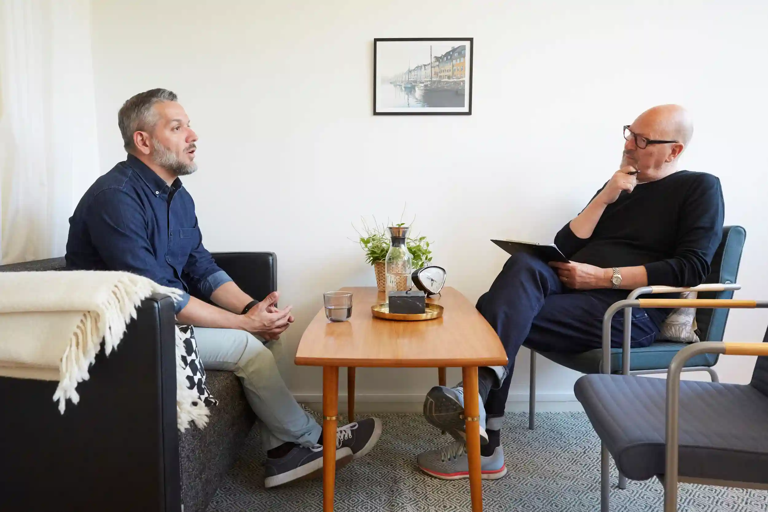 Man talking to a counselor.